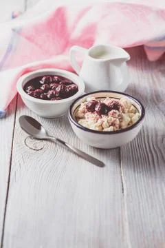 Cottage cheese with cherry jam Stock Photos