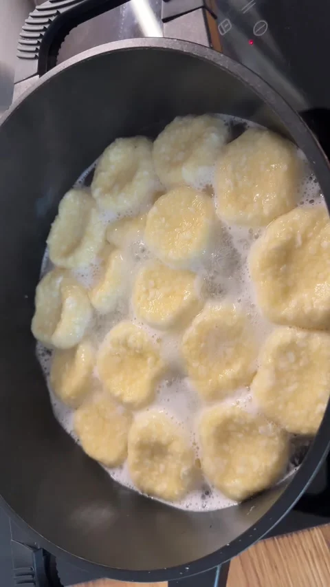 Cottage Cheese Dumplings Boiling in Pot, Close-Up Food Preparation Stock Footage 344602258