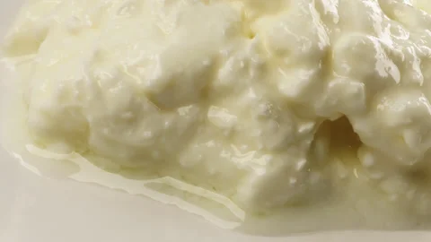 Cottage cheese macro close up presentation slowly rotating stock footage Stock Footage 344687898
