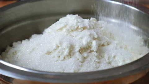 Cottage cheese is mixed with sugar Stock Footage 196130093