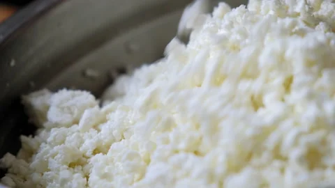 Cottage cheese is mixed with sugar Stock Footage 196138095