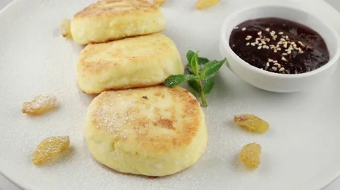 Cottage cheese pancakes with jam Stock Footage 58002490