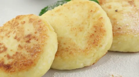 Cottage cheese pancakes with jam (loop) Stock Footage 58003175