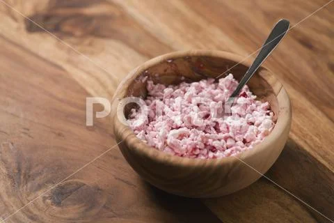 Cottage cheese with sour cream and cowberry jam in wood bowl on table Stock Photos