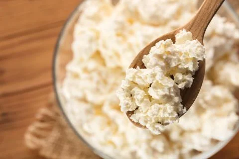 Cottage cheese in a spoon Stock-Fotos