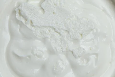 Cottage cheese texture background close-up. Stock-Fotos
