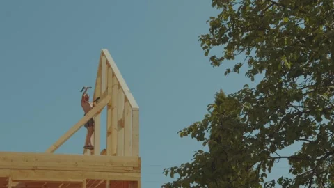Cottage construction, builders, construction workers' work processes Stock Footage 339506313