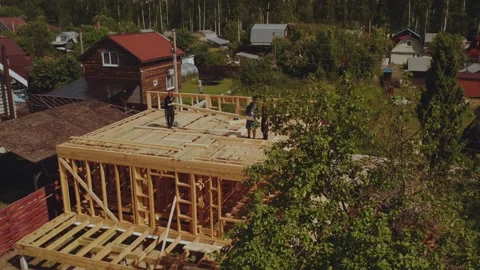 Cottage construction, builders, construction workers' work processes Stock Footage 339506446