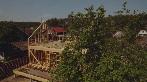 Cottage construction, builders, construction workers' work processes Stock Footage 339506562