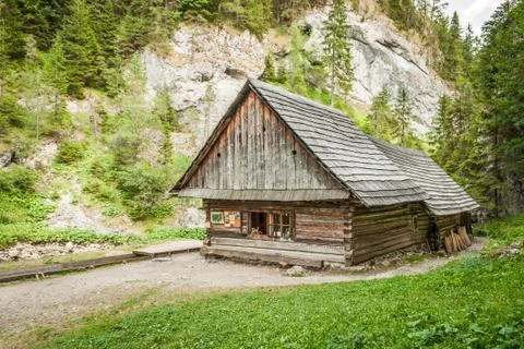 Cottage in the mountains Stock Photos