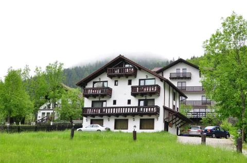 Cottage in the mountains Stock Photos