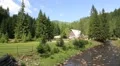 Cottage near mountain river in Carpathians, Ukraine HD Footage