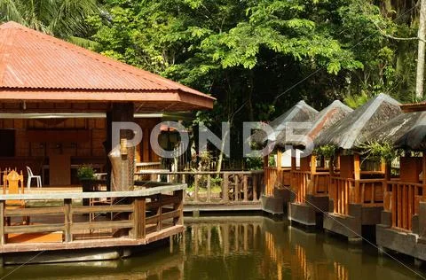 Cottage Resort on Water Pond Stock Photos