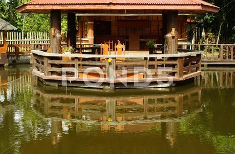 Cottage Resort on Water Pond Stock Photos