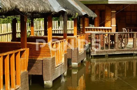Cottage Resort on Water Pond Stock Photos
