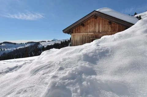 Cottage under snow Stock Photos
