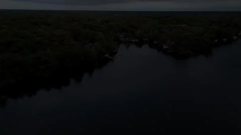 Cottages in bay at night Stock Footage 321435174