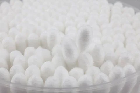 Cotton buds in container Stock Photos