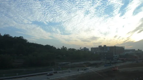 Cotton candy cloud sunset from train Stock Footage 122699571