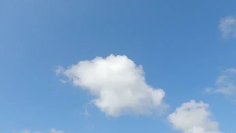 Cotton candy cumulus cloudscape on beautiful sunny clear blue sky Video stock 148188119