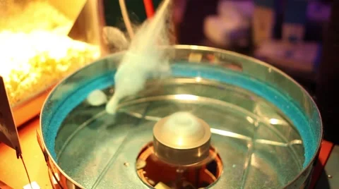 Cotton candy machine, Cotton Candy machine spinning in slow motion Stock Footage 58599066
