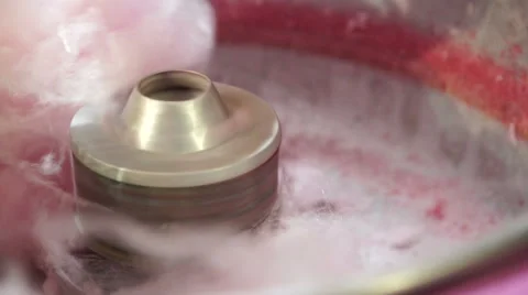 Cotton candy or candy floss being made in a fairground Stock-Footage 44688085