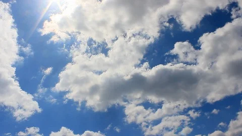 Cotton Clouds, Sunlights and Blue Sky Stock Footage 106131241