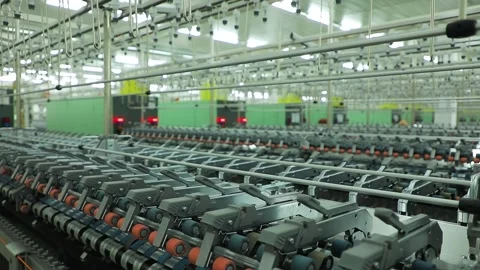 Cotton processing plant, machine part, many parts, orange rollers Stock Footage 208110647