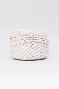 Cotton ropes are material for macrame weaving. Over the white background surf Stock Photos