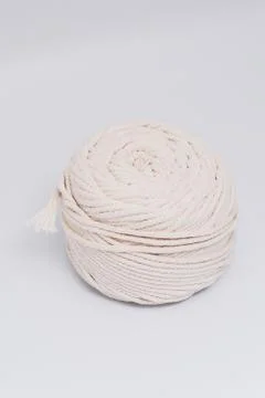 Cotton ropes are material for macrame weaving. Over the white background surf Stock Photos