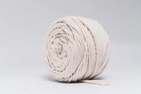 Cotton ropes are material for macrame weaving. Over the white background surf Stock-Fotos