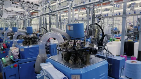 Cotton socks production process in garment factory, automated process, sock goes Stock Footage 239782554