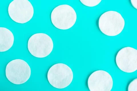 Cotton sponges pattern on blue background, minimal concept, copy space Stock Photos