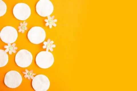 Cotton sponges pattern on orange background, minimal concept, copy space Stock Photos