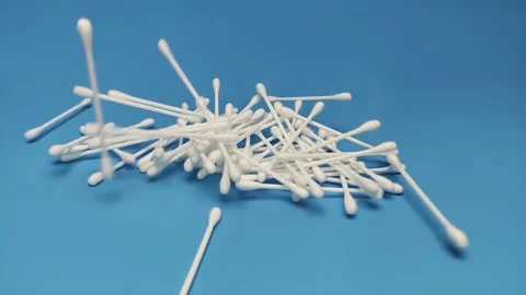 Cotton swabs fall on the table Stock Footage 256014777