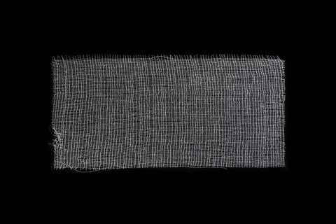 Cotton thread bandage rectangle on black background, close up photography b.. Stock Photos