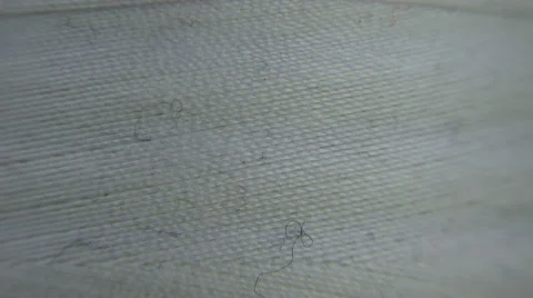 Cotton thread Rotating, close up of detail and texture. (can play as loop) Stock Footage 60951841