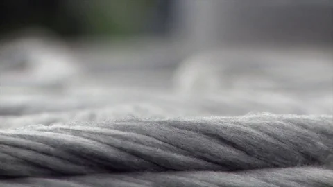 Cotton yarn drawn from storage in textile industry. Stock Footage 72600550