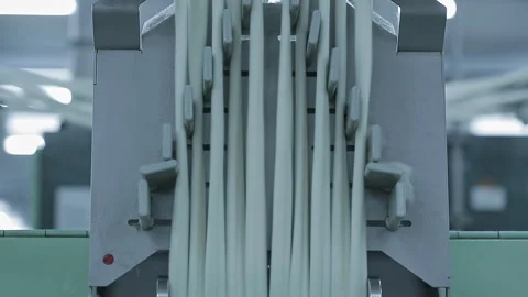 Cotton yarn moves along the rollers of spinning machines. Textile factory Vídeos de archivo 255921066