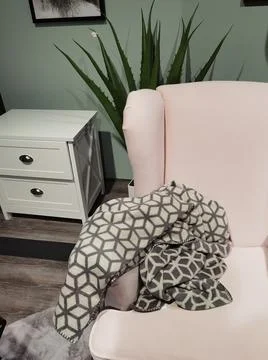 Couch with blanket in winter Stock Photos