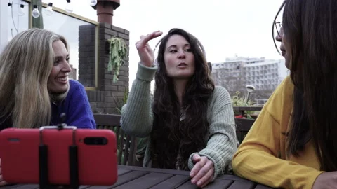 Couch live streaming on their smartphones. Camera in hand Video stock 154397333