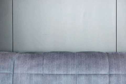 Couch or Bed Head Against Wall with Copy Space Stock Photos