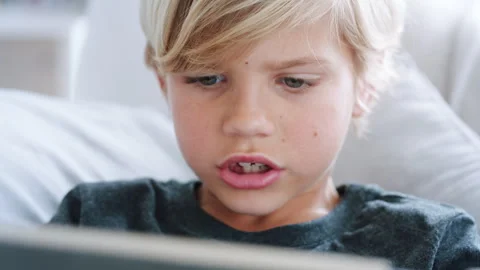 Couch, speaking or child with tablet for gaming, digital world or interactive Stock Footage 331437331
