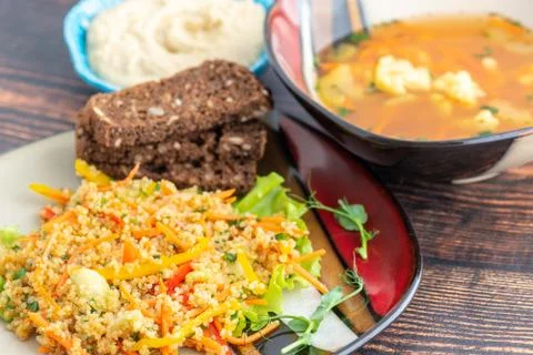 Coucous soup bread dinner Stock Photos