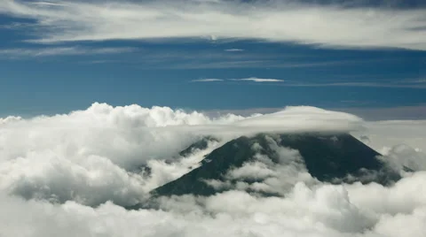 Coud streams over summit of Mount Merapi, Indonesia Stock Footage 45351685