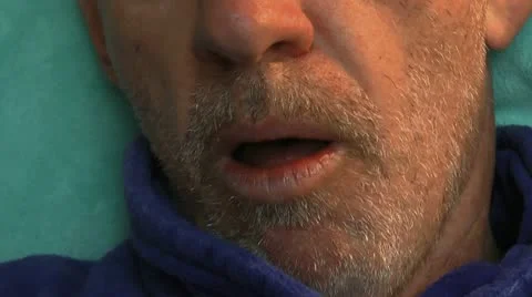 Coughing Man Drinks Orange Juice Stock Footage