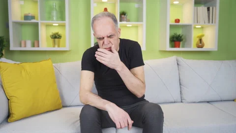 Coughing old sick man. Stock Footage 235451818