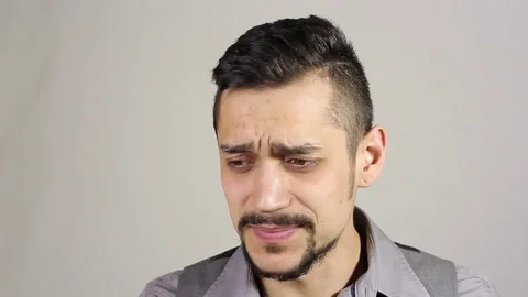 Coughing young bearded man Video stock 73685872