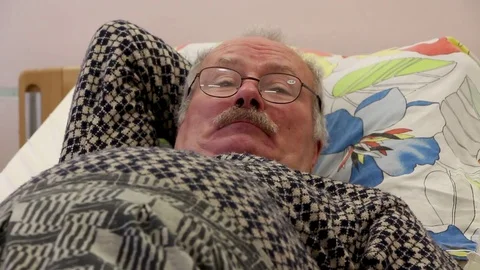 Coughs old man hosp bed Stock Footage 81836161
