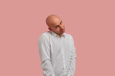 Could I, please. Funny bald gay with bristle tilted his head to asking his bo Foto stock